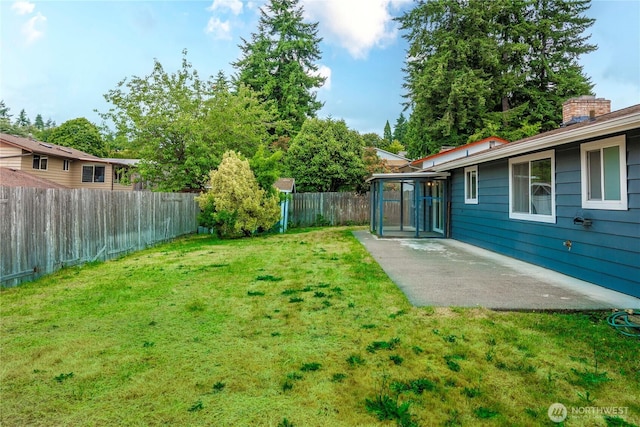2530 SW 325th Pl, Federal Way, WA 98003 - fenced backyard featuring a patio area