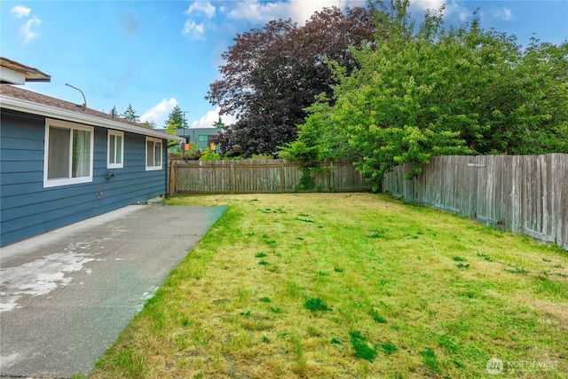 2530 SW 325th Pl, Federal Way, WA 98003 - fenced backyard featuring a patio
