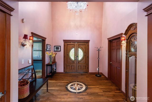 3151 Velvet Ln, Custer, WA 98240 - foyer featuring wood finished floors, a high ceiling, and a chandelier