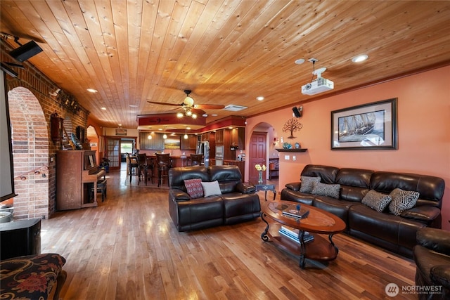 3151 Velvet Ln, Custer, WA 98240 - living area with arched walkways, hardwood / wood-style flooring, wooden ceiling, a ceiling fan, and recessed lighting