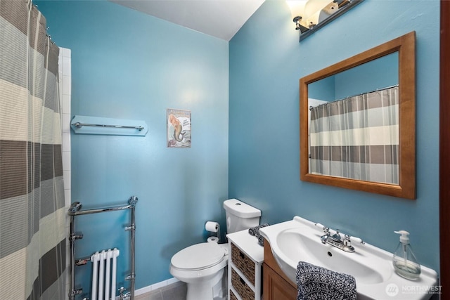 3151 Velvet Ln, Custer, WA 98240 - full bathroom with radiator heating unit, vanity, and tile patterned flooring