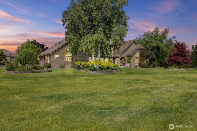 78718 Echols Rd, Hermiston, OR 97838 - yard at dusk with a lawn