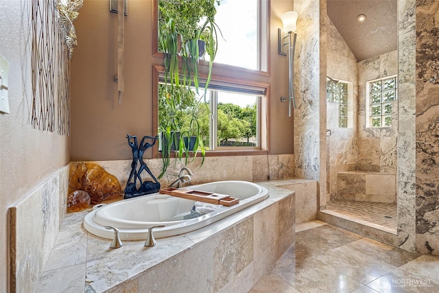 78718 Echols Rd, Hermiston, OR 97838 - full bathroom featuring a garden tub, a tile shower, marble tiled floors, and a high ceiling