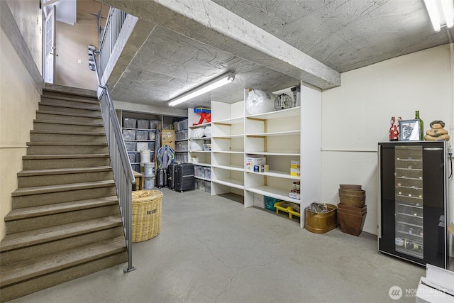 78718 Echols Rd, Hermiston, OR 97838 - finished basement featuring stairs and wine cooler