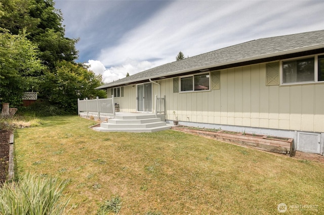 218 Holly Ln, Cosmopolis, WA 98537 - view of front of house with a front yard and a shingled roof