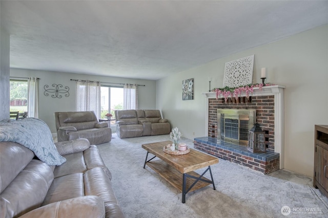 218 Holly Ln, Cosmopolis, WA 98537 - living area with carpet, plenty of natural light, and a brick fireplace