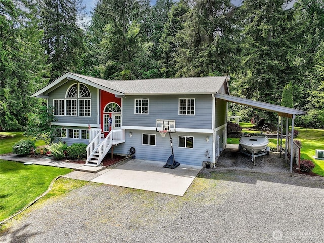 19322 Old Burn Rd, Arlington, WA 98223 - raised ranch featuring gravel driveway, a carport, and a front lawn