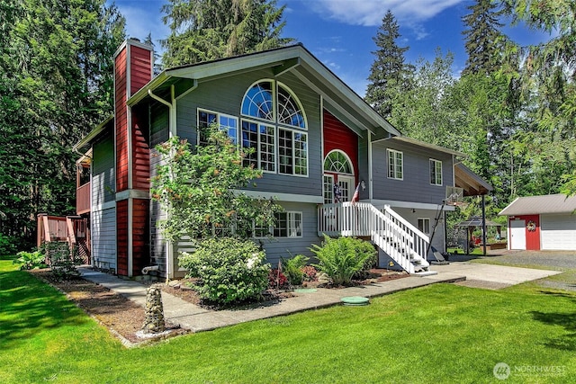 19322 Old Burn Rd, Arlington, WA 98223 - bi-level home with a chimney, a front lawn, and an outdoor structure