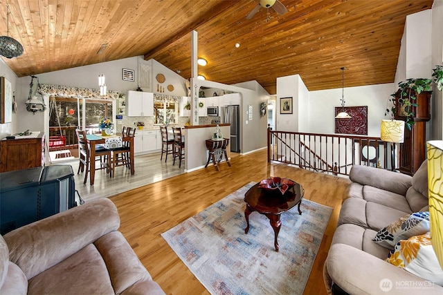 19322 Old Burn Rd, Arlington, WA 98223 - living area with wood ceiling, light wood-style floors, ceiling fan, and high vaulted ceiling