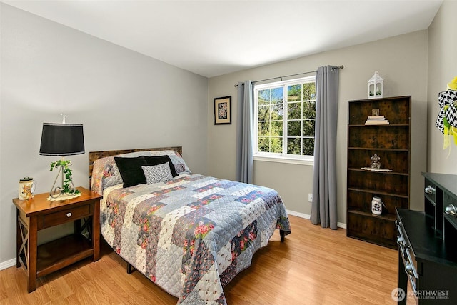 19322 Old Burn Rd, Arlington, WA 98223 - bedroom with light wood-style floors and baseboards