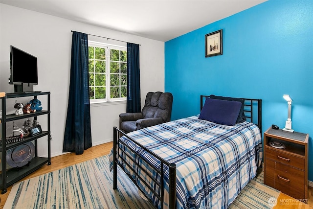 19322 Old Burn Rd, Arlington, WA 98223 - bedroom featuring wood finished floors and baseboards