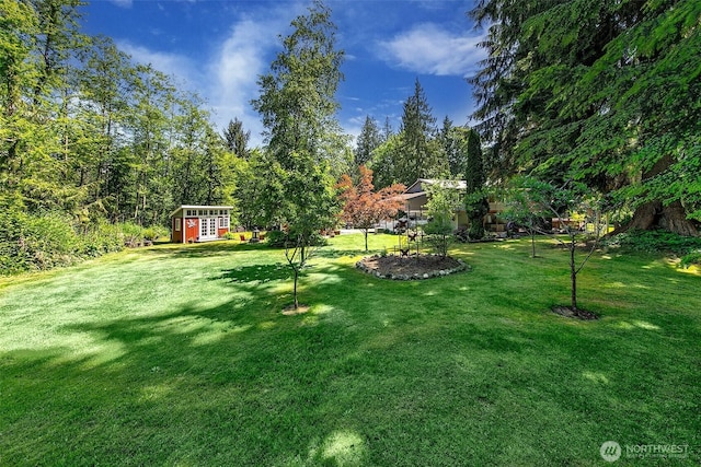 19322 Old Burn Rd, Arlington, WA 98223 - view of green lawn featuring a storage shed