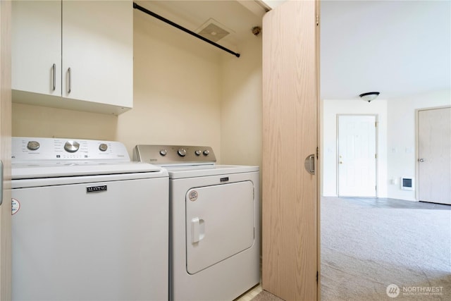 11130 SE 208th St Unit K101, Kent, WA 98031 - laundry room with washing machine and clothes dryer and light colored carpet