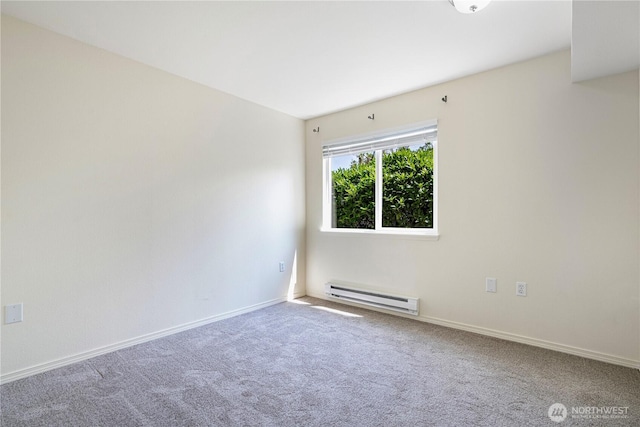 11130 SE 208th St Unit K101, Kent, WA 98031 - carpeted spare room featuring a baseboard radiator and baseboards