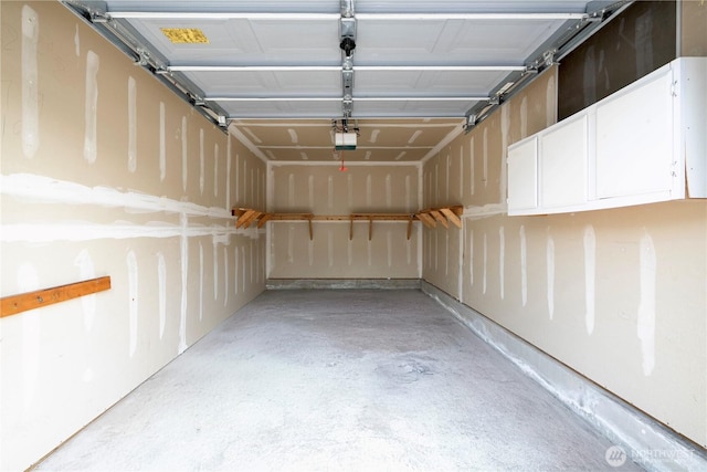 11130 SE 208th St Unit K101, Kent, WA 98031 - garage featuring a garage door opener