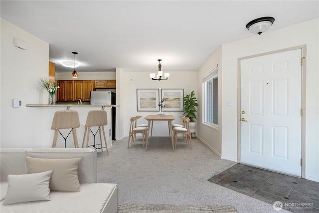 11130 SE 208th St Unit K101, Kent, WA 98031 - living area featuring a chandelier and carpet