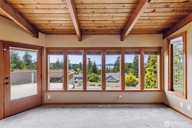705 Shelter Bay Dr, La Conner, WA 98257 - unfurnished sunroom with carpet flooring and a wood ceiling with exposed beams
