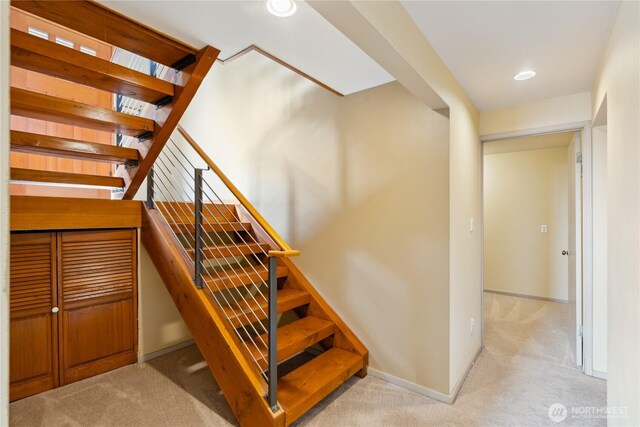 705 Shelter Bay Dr, La Conner, WA 98257 - staircase featuring carpet flooring and recessed lighting
