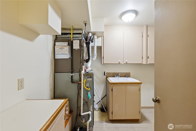 705 Shelter Bay Dr, La Conner, WA 98257 - laundry room featuring a sink and heating unit
