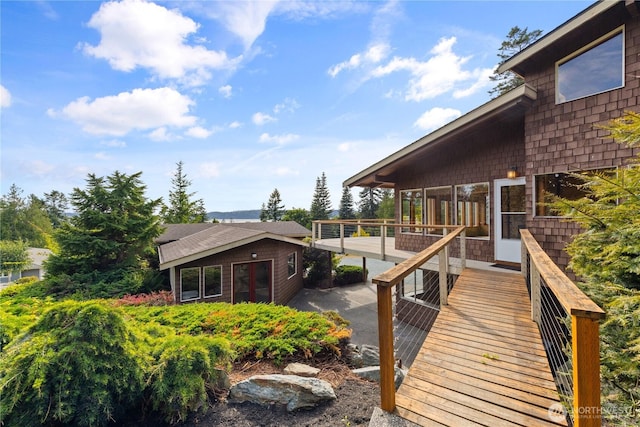 705 Shelter Bay Dr, La Conner, WA 98257 - wooden deck featuring a sunroom