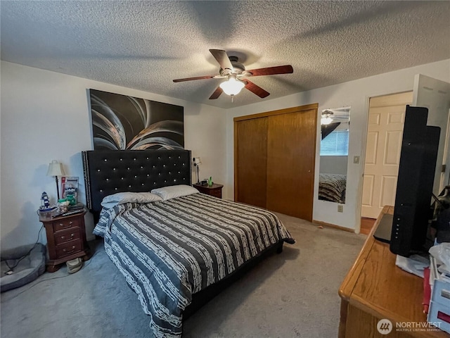 351N Grape, Moses Lake, WA 98837 - carpeted bedroom with a closet, ceiling fan, and a textured ceiling