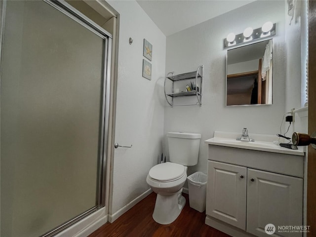 351N Grape, Moses Lake, WA 98837 - full bath featuring wood finished floors, vanity, and a shower stall