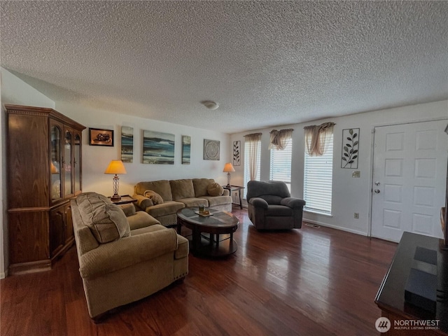 351N Grape, Moses Lake, WA 98837 - living area featuring a textured ceiling and wood finished floors
