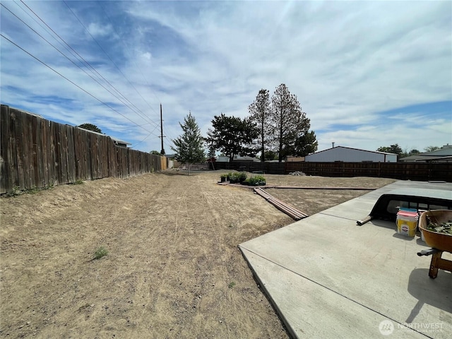 351N Grape, Moses Lake, WA 98837 - fenced backyard with a patio