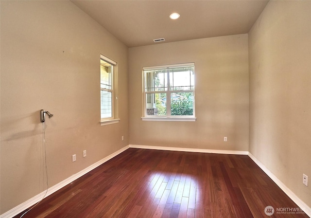 8025 Columbia Way NE, Lacey, WA 98516 - empty room featuring dark wood-type flooring and baseboards