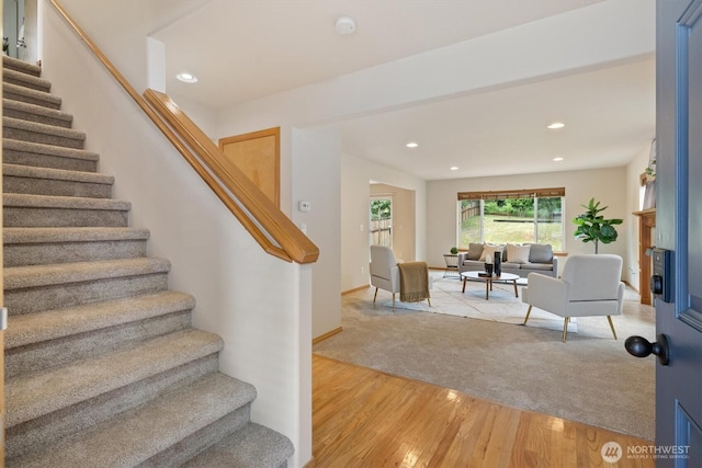 817 Darwins Way, Granite Falls, WA 98252 - staircase with recessed lighting, wood finished floors, and carpet
