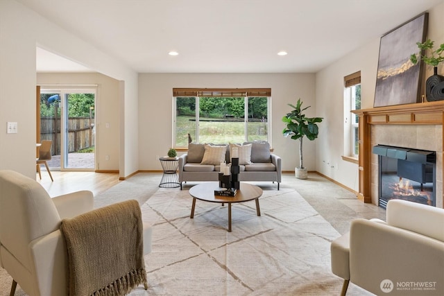 817 Darwins Way, Granite Falls, WA 98252 - living area featuring healthy amount of natural light, a fireplace, recessed lighting, and light colored carpet