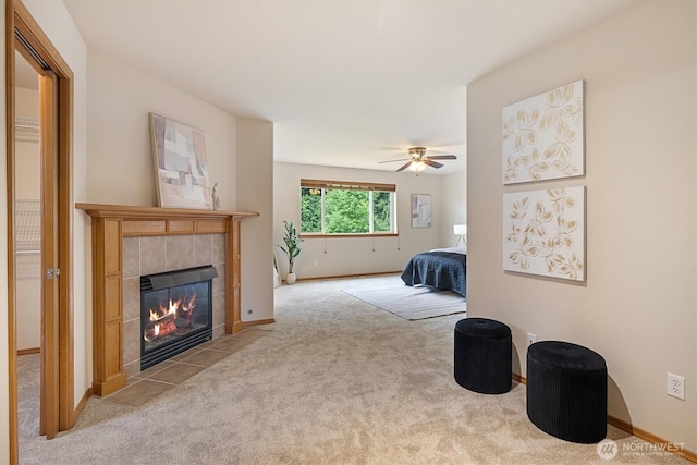817 Darwins Way, Granite Falls, WA 98252 - carpeted living room with a tile fireplace and ceiling fan