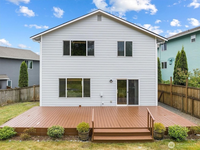 817 Darwins Way, Granite Falls, WA 98252 - rear view of house with a fenced backyard and a deck