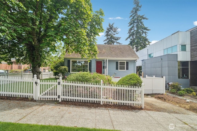 603 NW 52nd St, Seattle, WA 98107 - view of front of property with a fenced front yard and a gate