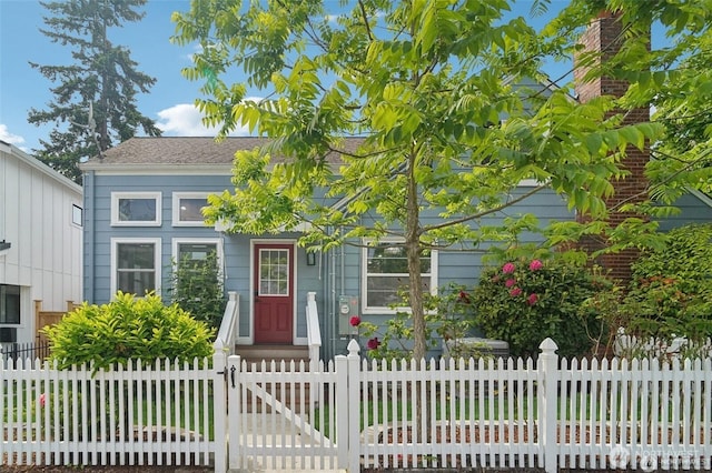 603 NW 52nd St, Seattle, WA 98107 - view of front facade featuring a fenced front yard and a gate