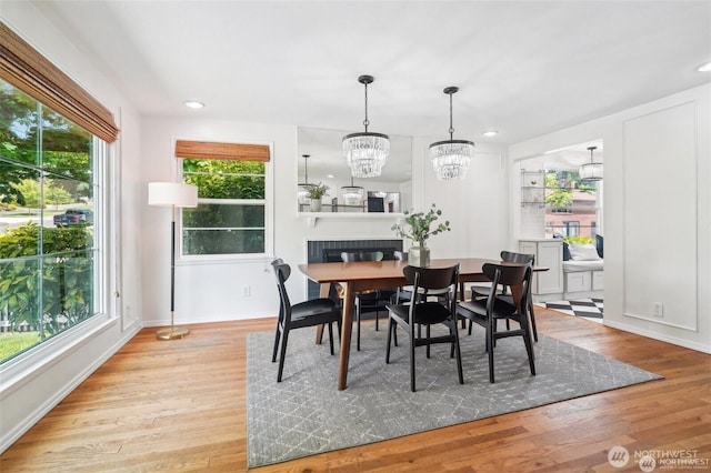 603 NW 52nd St, Seattle, WA 98107 - dining area featuring light wood finished floors, a chandelier, and recessed lighting