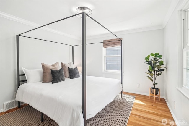 603 NW 52nd St, Seattle, WA 98107 - bedroom featuring light wood-style floors and ornamental molding