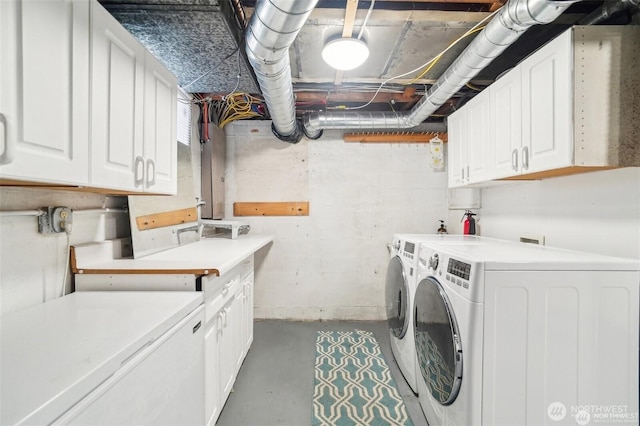 603 NW 52nd St, Seattle, WA 98107 - laundry room featuring cabinet space and washer and dryer