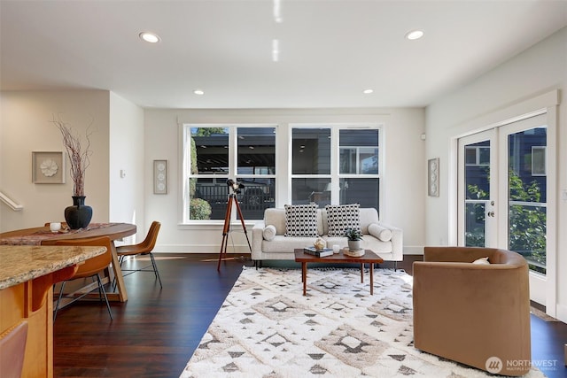 2063 13th Ave W, Seattle, WA 98119 - living room with dark wood finished floors, plenty of natural light, recessed lighting, and french doors