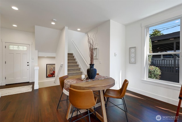 2063 13th Ave W, Seattle, WA 98119 - dining space with dark wood-type flooring, stairs, and recessed lighting
