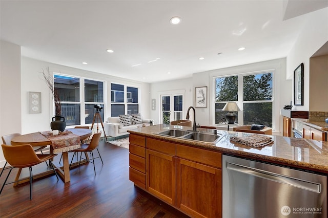2063 13th Ave W, Seattle, WA 98119 - kitchen with dishwasher, brown cabinets, open floor plan, dark wood-type flooring, and recessed lighting