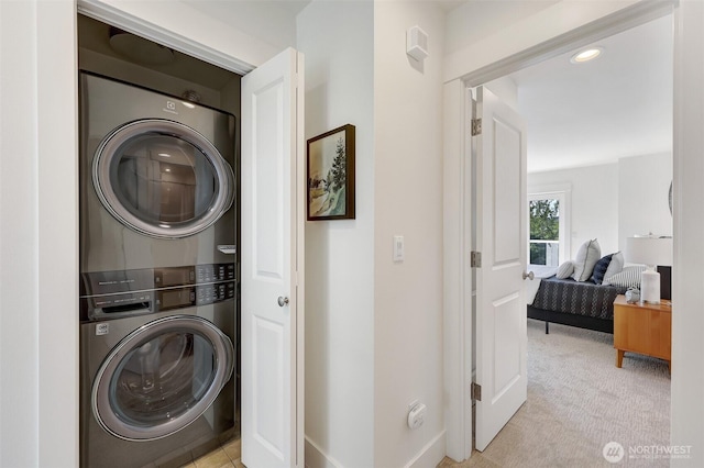 2063 13th Ave W, Seattle, WA 98119 - laundry area with stacked washer / dryer, light colored carpet, and recessed lighting