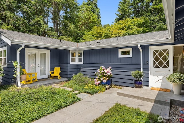 10430 NE Cascade St, Bainbridge Island, WA 98110 - view of front facade featuring board and batten siding and a shingled roof