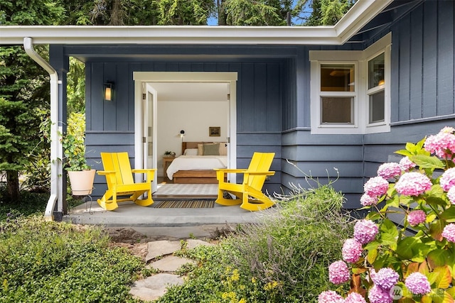 10430 NE Cascade St, Bainbridge Island, WA 98110 - view of exterior entry with board and batten siding