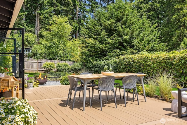10430 NE Cascade St, Bainbridge Island, WA 98110 - deck featuring a fire pit and outdoor dining space