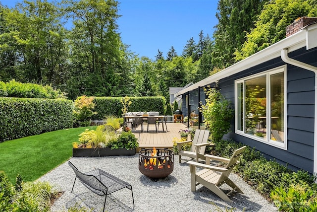 10430 NE Cascade St, Bainbridge Island, WA 98110 - view of patio / terrace featuring a fire pit and a wooden deck