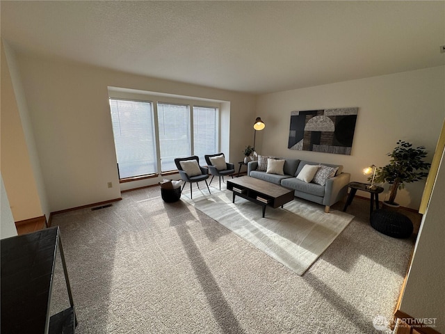18509 22nd Ave E, Tacoma, WA 98445 - carpeted living room featuring baseboards