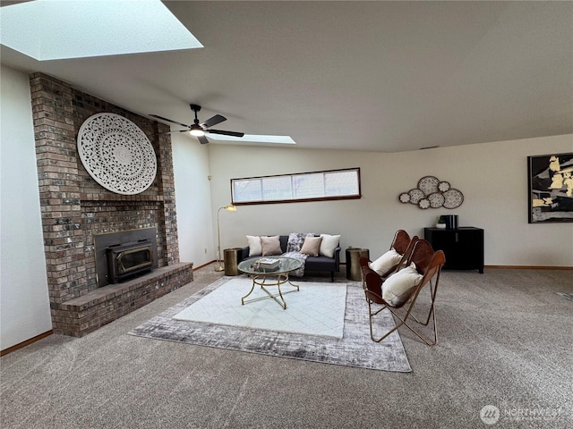 18509 22nd Ave E, Tacoma, WA 98445 - carpeted living area featuring a skylight, a ceiling fan, vaulted ceiling, and a wood stove
