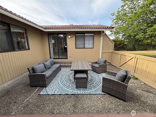 18509 22nd Ave E, Tacoma, WA 98445 - fenced backyard featuring an outdoor hangout area and a patio area