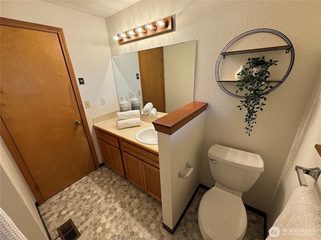 18509 22nd Ave E, Tacoma, WA 98445 - half bathroom with vanity, tile patterned floors, and a textured wall